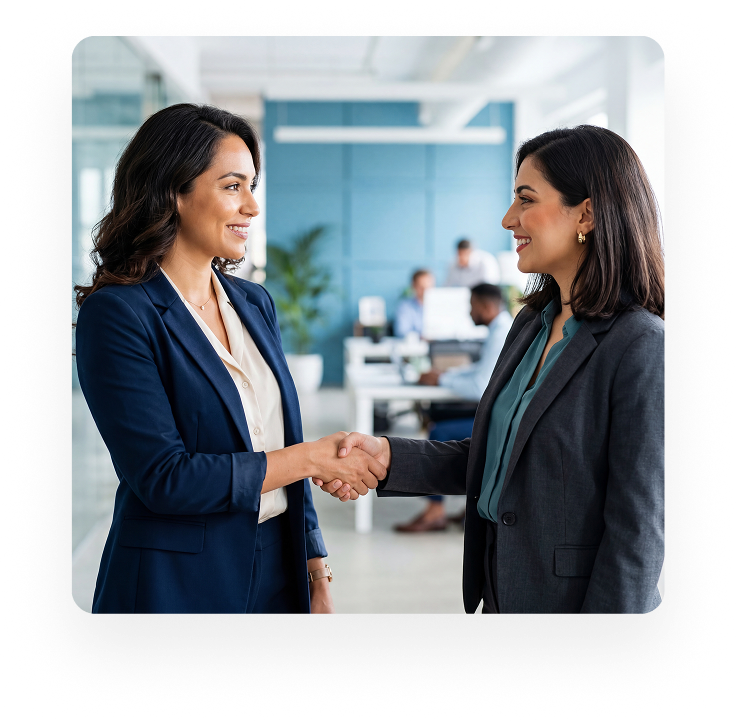 Two women shaking hands